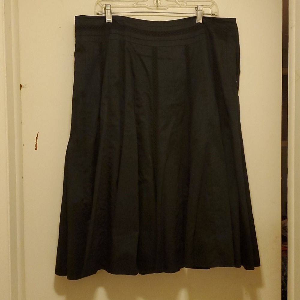 Black skirt with decorative pattern laced in